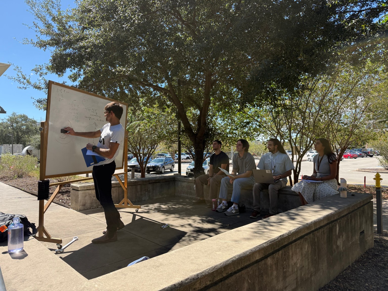 Daniel Cohen teaching orbital mechanics to NASA interns outdoors on 9 October 2026