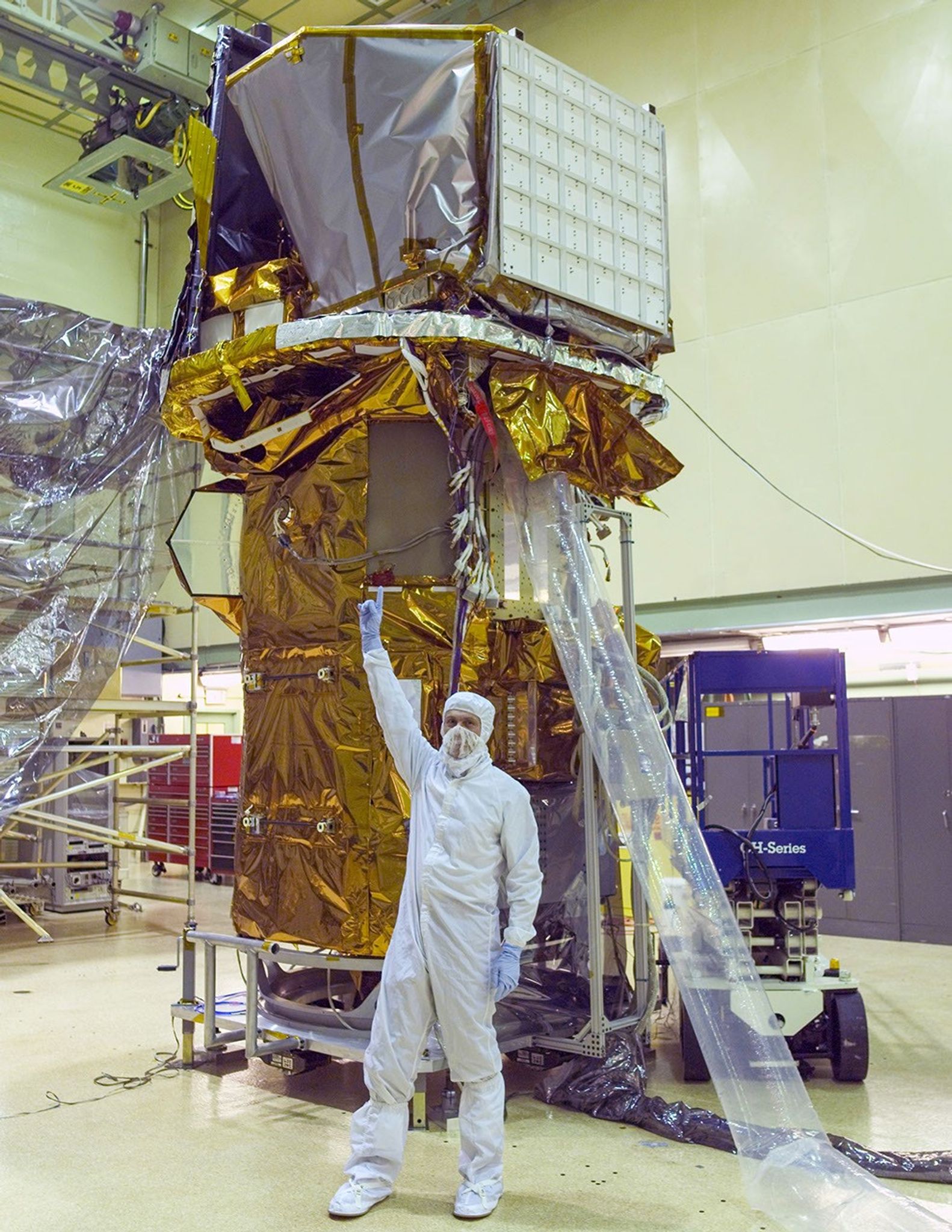Neil Gehrels with the Swift spacecraft in a clean room at NASA Goddard in 2003